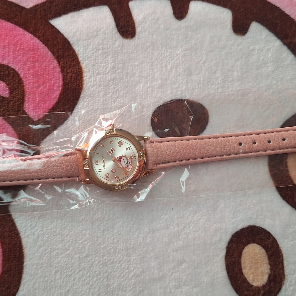 Pink Watch with Gold Accents